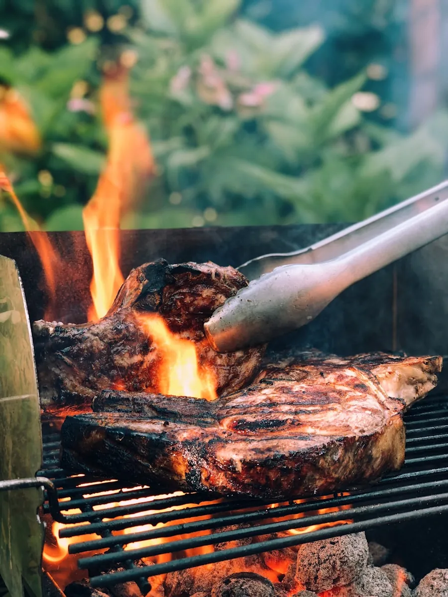 Copper Pot's open fire grill cooking over hardwood coals