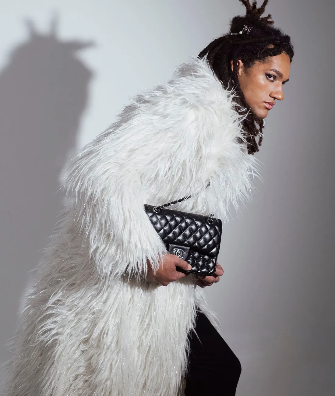Maison Noir Fall / Winter 2026 lookbook — model in a white shearling coat