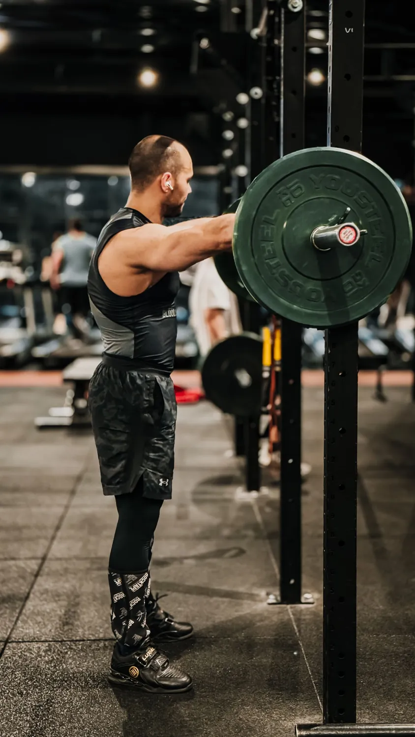 Athlete performing a barbell strength lift